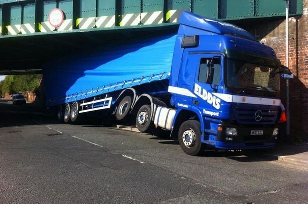 Lorry-stuck-under-a-bridge.jpg